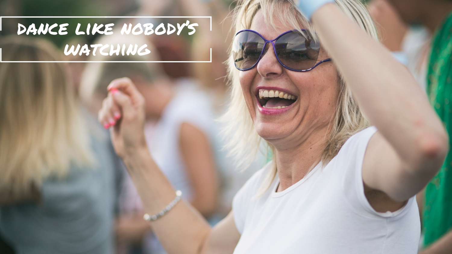 woman dancing at a music festival solo